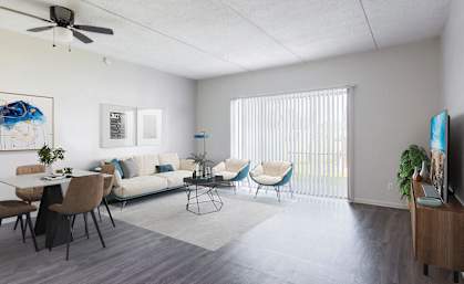 a living room and dining room with a couch and chairs and a table