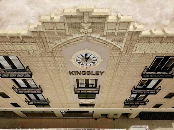 a large building with a clock on the front of it