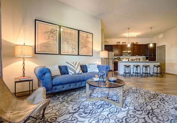 a living room with a couch and a table
