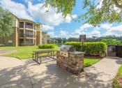 Thumbnail 4 of 13 - Park Del Mar Apartments grilling areas with picnic tables