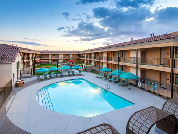 Villa Cielo Cortaro Apartments in Tucson, Arizona Exterior and Pool at Dusk