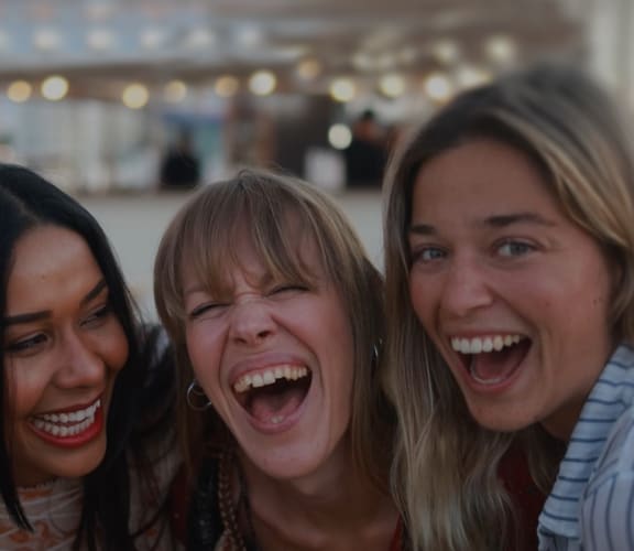 a group of women laughing