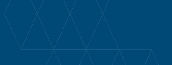 A geometric pattern of triangles on a blue background.