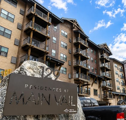 A large apartment complex named Residences at Main Vail.