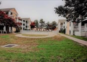 Thumbnail 2 of 15 - Image of courtyard with apartments and pool