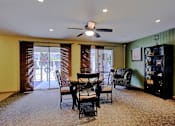 Thumbnail 6 of 25 - Image of clubhouse with table and chairs
