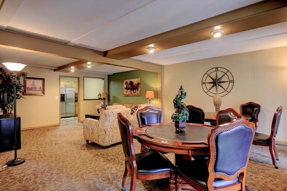 Image of clubhouse with table and chairs