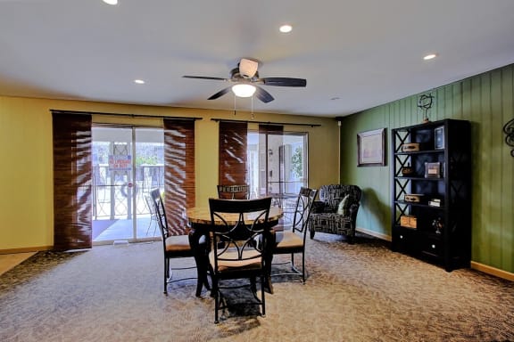 Image of clubhouse with table and chairs