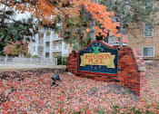 Thumbnail 15 of 15 - Image of Jefferson Place East sign with trees