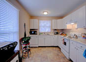 Thumbnail 9 of 25 - Image of kitchen with  cabinets and appliances
