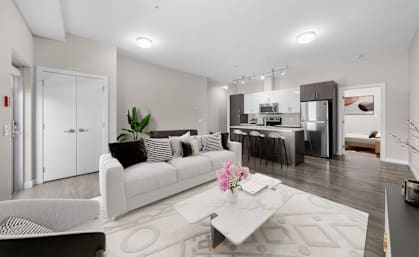 a living room with a couch and a table