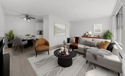 a living room with a couch and a table