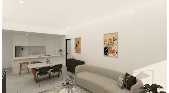 A modern living room with a grey couch and a dining table.