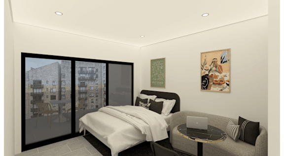 A bedroom with a bed, a couch, and a painting on the wall.