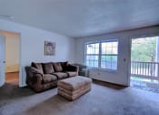 Thumbnail 3 of 15 - Image of carpeted room with furniture and window