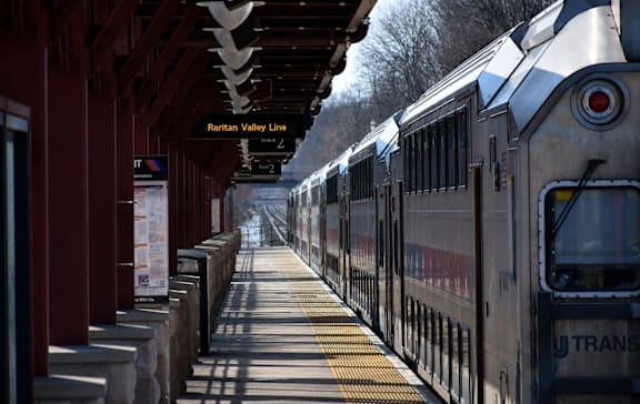 A train is pulling into the Raritan Valley Line.