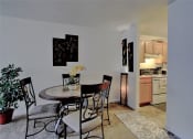 Thumbnail 8 of 15 - Image of dining room with table and chairs