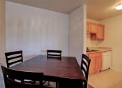 Thumbnail 9 of 15 - Image of dining room with table and chairs