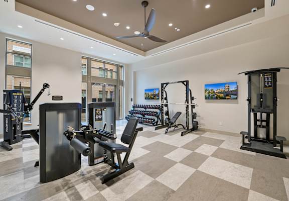 the gym at the enclave at woodbridge apartments in sugar land, tx