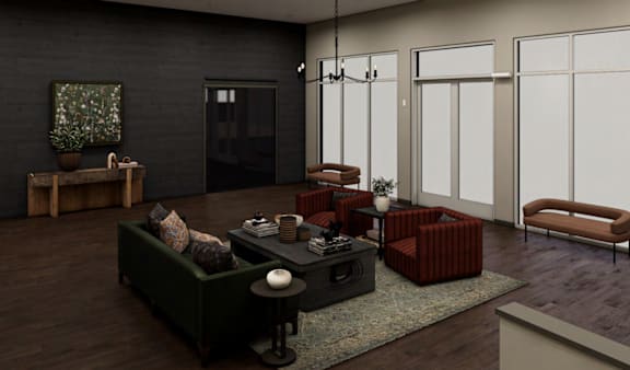 A living room with a green couch, a coffee table, and a red ottoman.