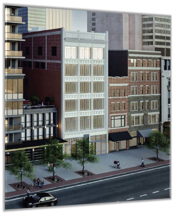 an aerial view of a city street with tall buildings at The Madison, Columbus