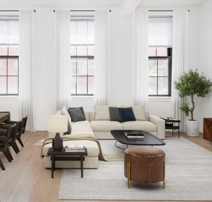 a living room with white walls and hardwood flooring at Grand Adams Apartment Owner LLC, Hoboken, NJ, 07030