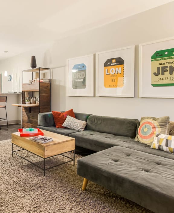 a living room with a couch and a table