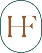 a green background with a gold letter h and a gold horn