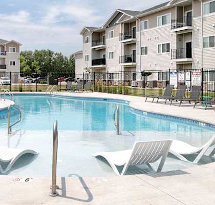 our apartments have a resort style pool with lounge chairs