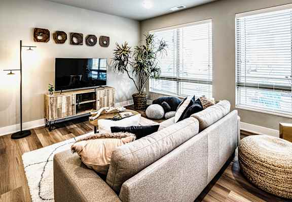 a living room with a couch and a tv