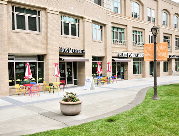 A building with a sign that says Don Marquis.