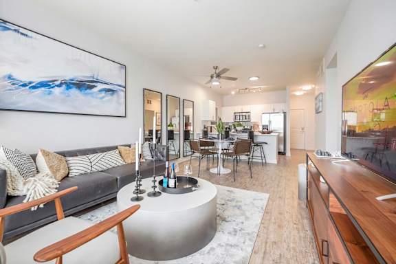 a jacuzzi pool and lounge chairs in an apartment building