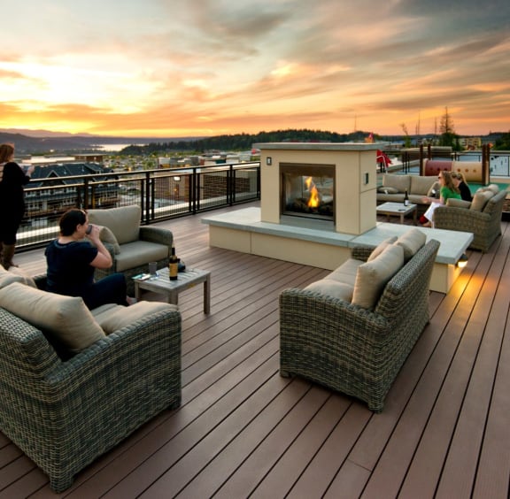 rooftop lounge during sunset at Discovery Heights Apartments in Issaquah, Washington