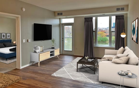 a living room with a couch and a television at Preserve at Shady Oak Apartments, Minnetonka , MN 55343