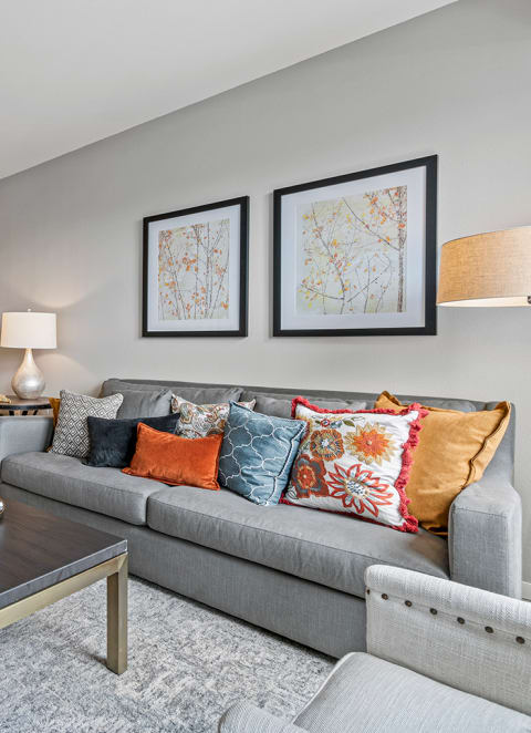 a living room with a couch and a coffee table at Brighton Oaks, New Brighton Minnesota