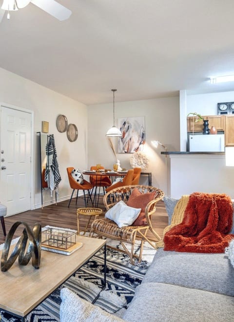 a living room with a couch and a table at Stoneridge Apartments, Pflugerville, TX 78660
