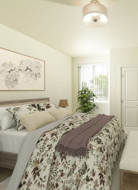 a living room with a white couch and two white chairs with blue and white pillows