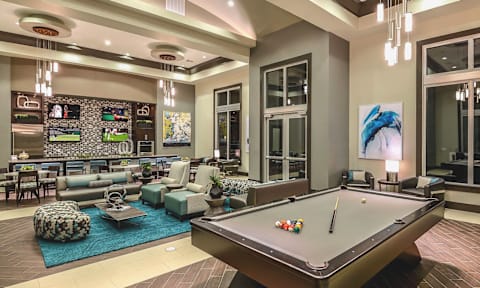 Clubhouse with Billiards at Epic at Gateway Luxury Apartments in Pinellas Park FL