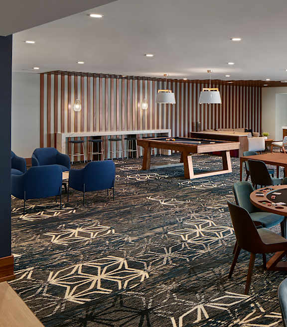 residents playing pool at AVE Florham Park