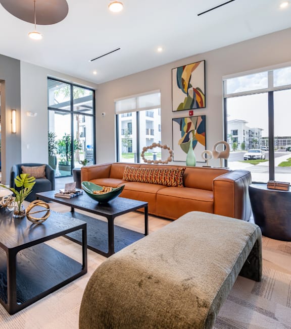 Lounge with Fireside Seating at Marquee Square Affordable Apartments in Tampa, FL