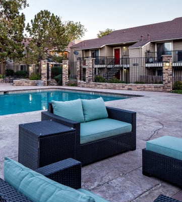 Poolside lounge chairs at Liberty Creek apartments in Aurora, CO.