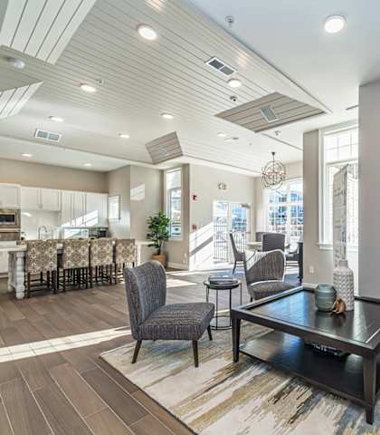 a living room with couches and chairs and a table at Sycamore Ridge, Gainesville, GA