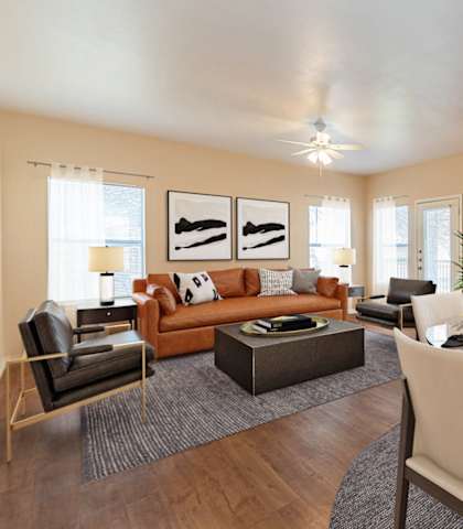 a living room and dining room with a table and chairs at The Springs, Texas, 78620