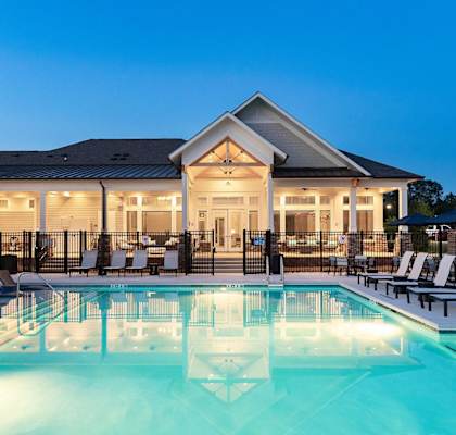 Pool and clubhouse at twilight at Carmel Vista, McDonough, 30253