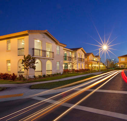 Dusk time street view of apartment buildings, Northpark at Scott Carver Apartments Miami, FL