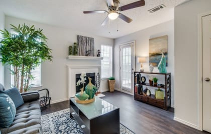 Charming Living Room With Standard Fireplace at Wildwood Apartments, CLEAR Property Management, Texas, 78752