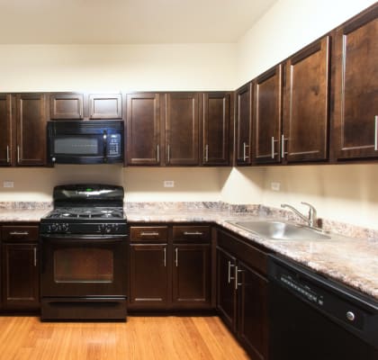 Kitchen at St. Nicholas Park Affordable Apartments in New York, New York
