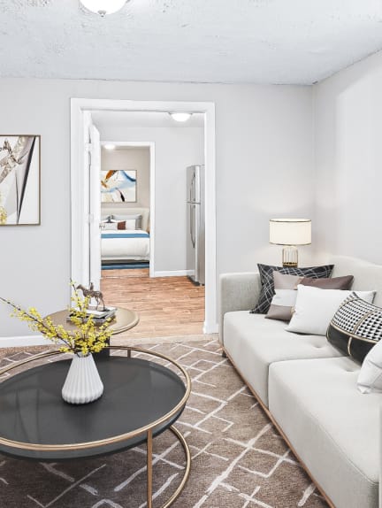 a living room with a couch and a table