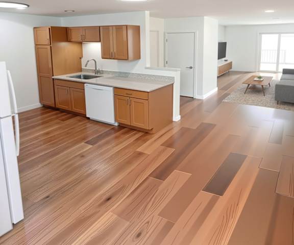 A kitchen with wooden floors and white appliances.