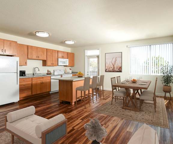 an open kitchen and dining room with a table and chairs